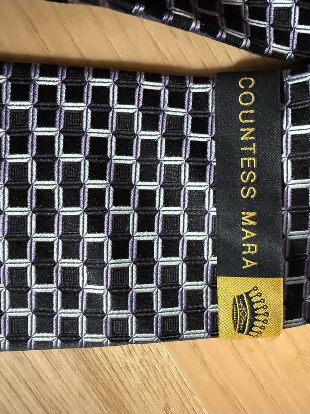Countess Mara Black Geometric Tie with Purple Accents